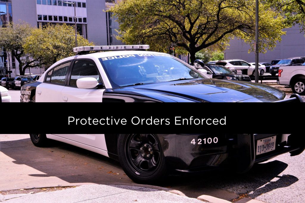 Police Enforce Protective Orders image of police car